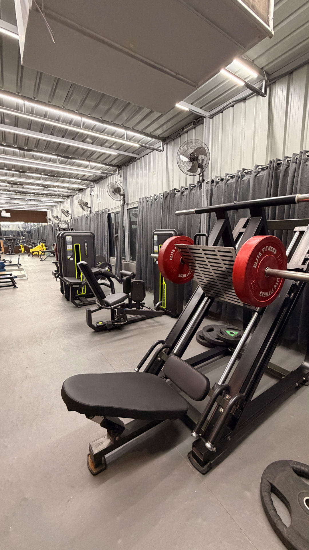 Leg press and strength machines on the Revive Fitnes gym floor