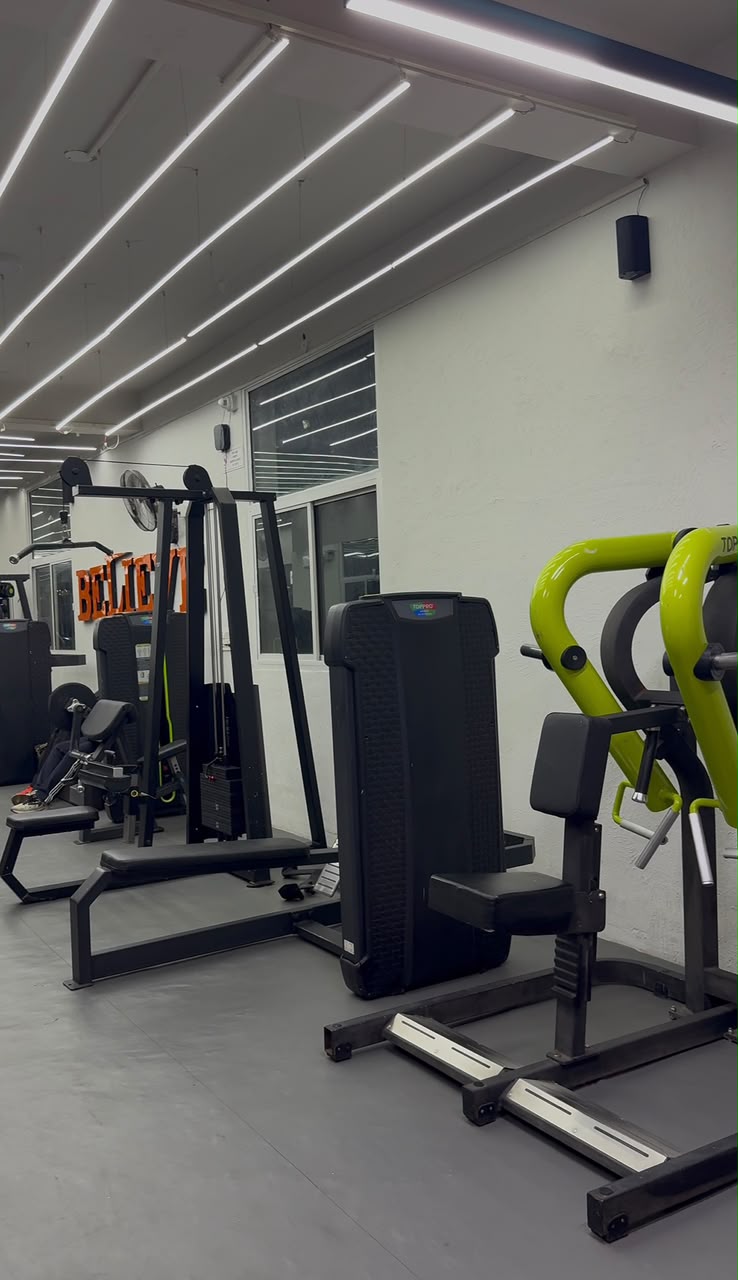 Modern resistance training machines at Revive Fitnes