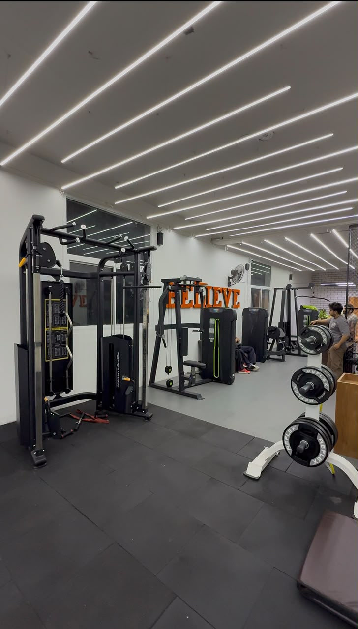 Cable machines and free weight area at Revive Fitnes